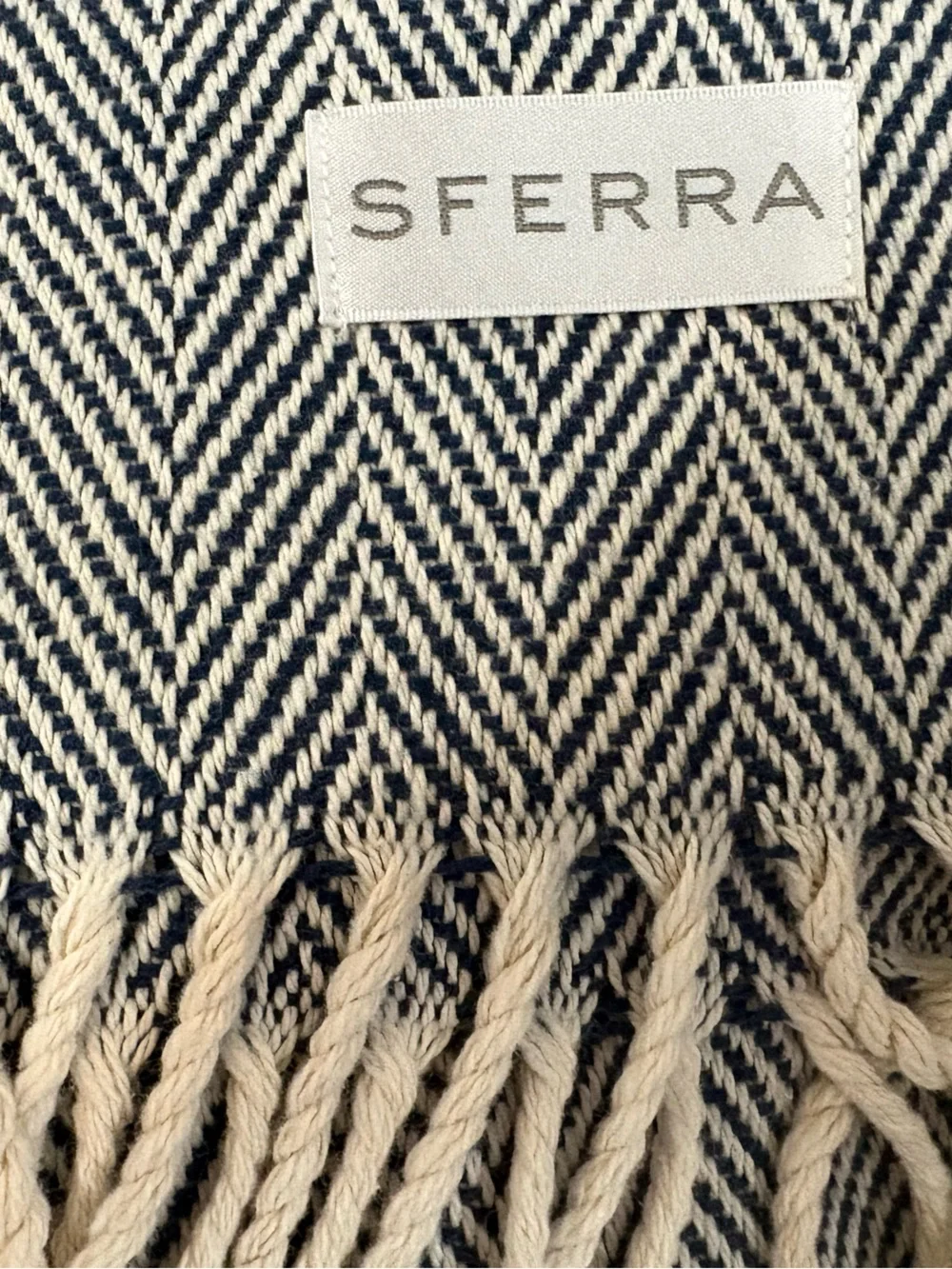SFERRA “Celine” Navy and Cream Herringbone Throw. NWT. 51x71in. 100% cotton.